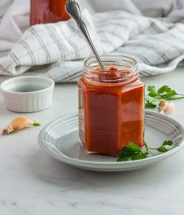 a jar sugar free barbeque sauce with garlic and parsley